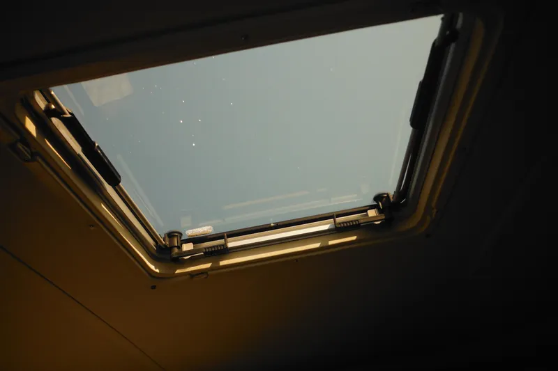 Slide: The Image of Hatch view from 2001 Tiara Yachts 3500 Open, showcasing clear sky. - 91