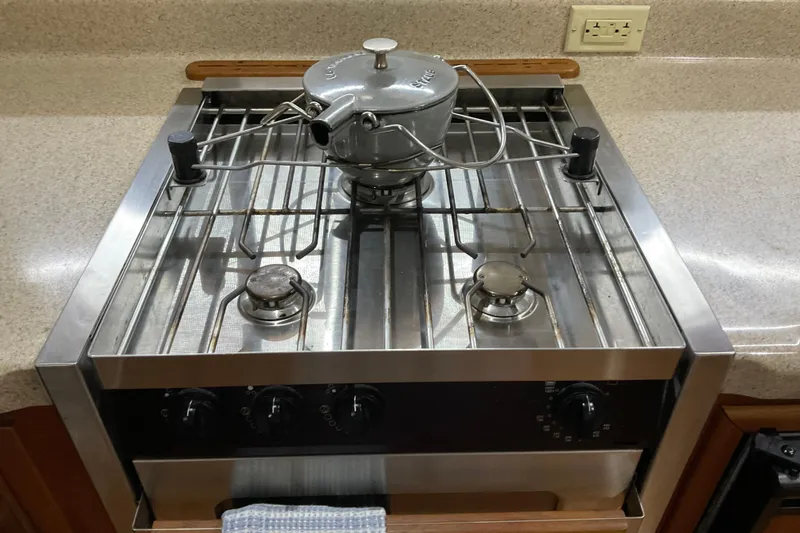 Slide: The Image of Stainless steel stove with kettle on American Tug 2002, Hull #24. - 13