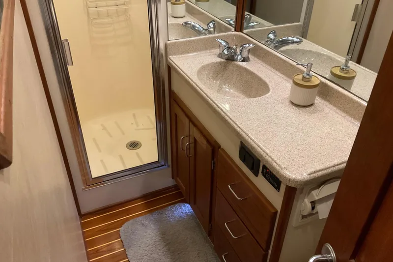 Slide: The Image of Bathroom interior of 2002 American Tug Hull #24 with shower and vanity. - 27