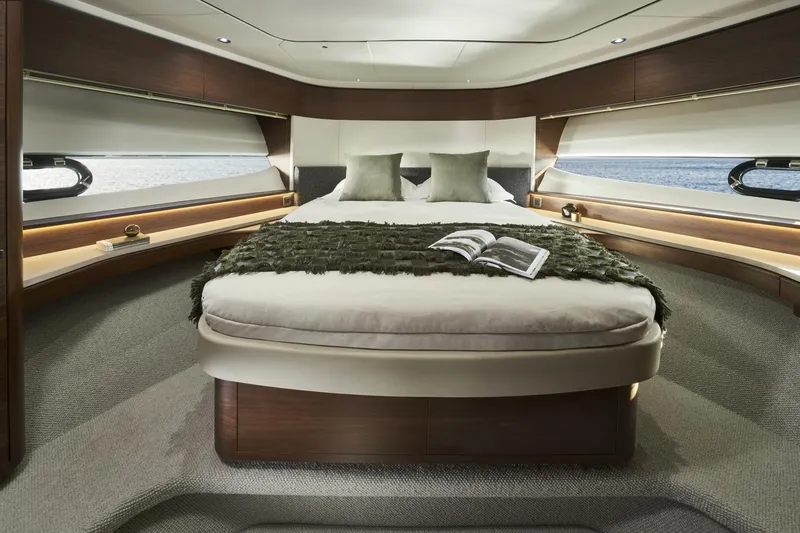 Slide: The Image of Luxurious cabin interior of 2026 Princess F65-079 yacht with elegant bedding and sea view. - 11
