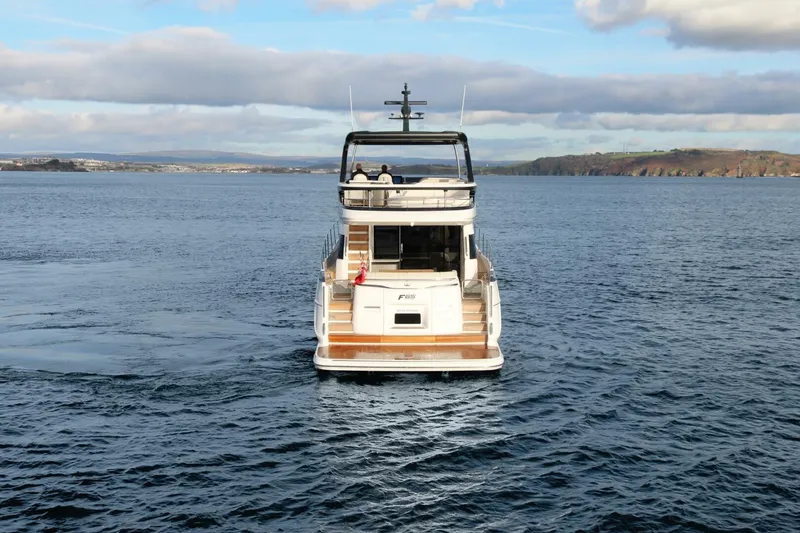 Slide: The Image of Luxury yacht Princess F65-079, 2026 model, cruising on open water. - 24