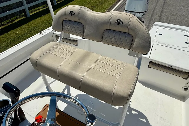 Slide: The Image of 2021 Sea Pro 208 Bay boat seat with beige upholstery and diamond stitching. - 10