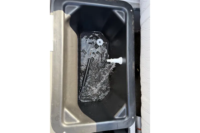 Slide: The Image of Interior view of Avalon Catalina Versatile Rear Bench 2023, featuring a black storage compartment. - 36