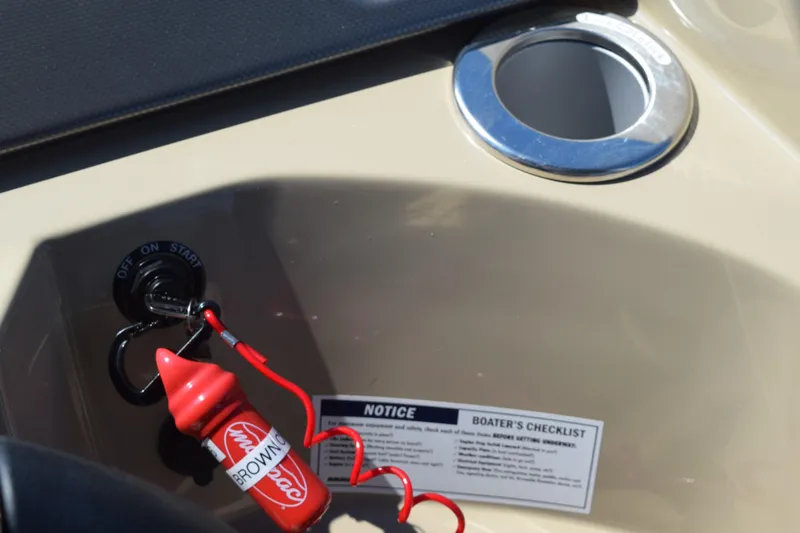 Slide: The Image of 2024 Crest Classic LX 220 L ignition with safety lanyard and boater's checklist. - 19