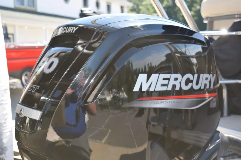 Slide: The Image of Mercury outboard motor on 2024 Crest Classic LX 220 L boat, close-up view. - 4