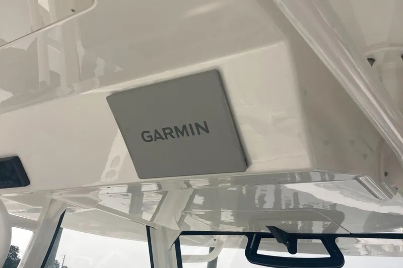 Slide: The Image of 2022 Regulator 37 boat with Garmin navigation system. - 13