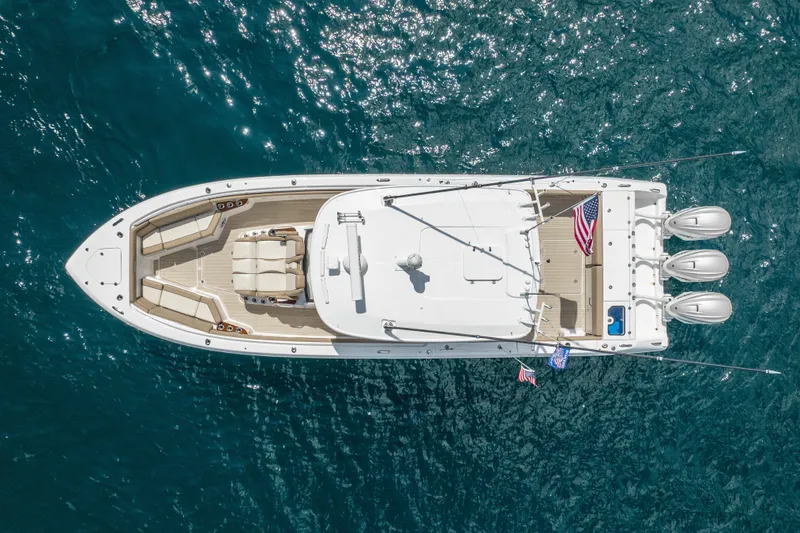Slide: The Image of Aerial view of 2021 Everglades 395 Center Console boat on blue water. - 10