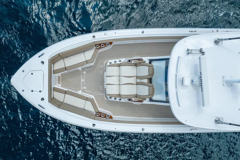 Slide: The Image of Overhead view of 2021 Everglades 395 Center Console boat on water. - 11