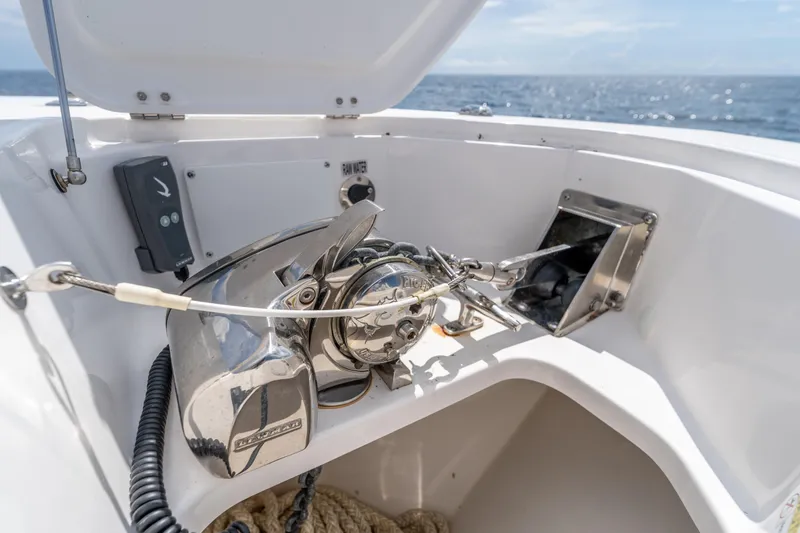 Slide: The Image of Anchor system on 2021 Everglades 395 Center Console boat, ocean in background. - 44