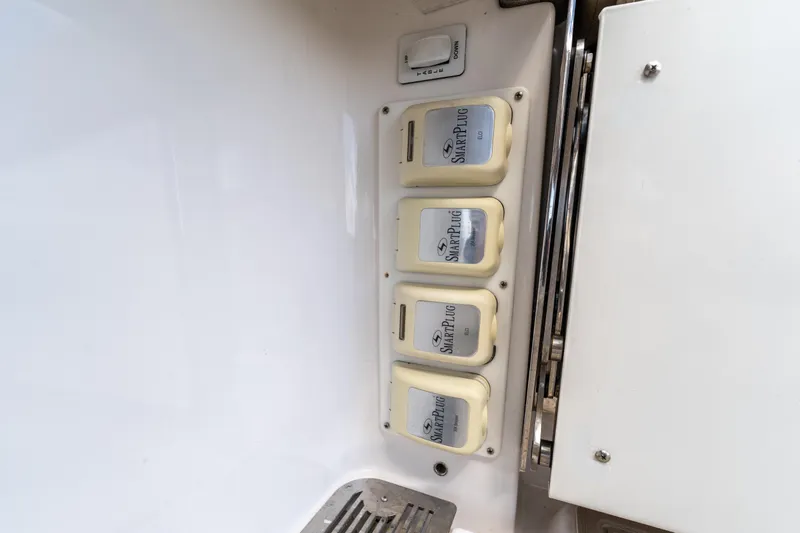 Slide: The Image of SmartPlug outlets on 2021 Everglades 395 Center Console boat interior. - 47