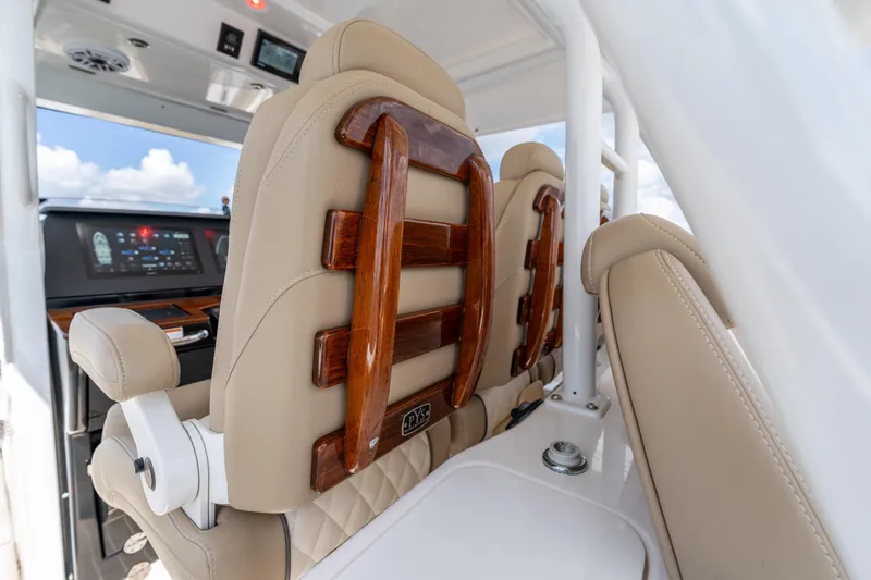 Slide: The Image of Luxurious seating on 2021 Everglades 395 Center Console boat interior, featuring elegant design. - 68
