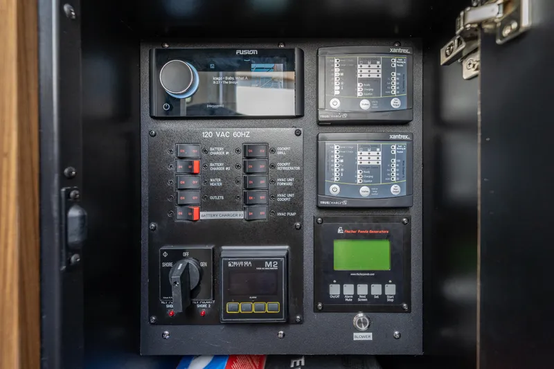 Slide: The Image of Electrical control panel on a 2021 Everglades 395 Center Console boat. - 80
