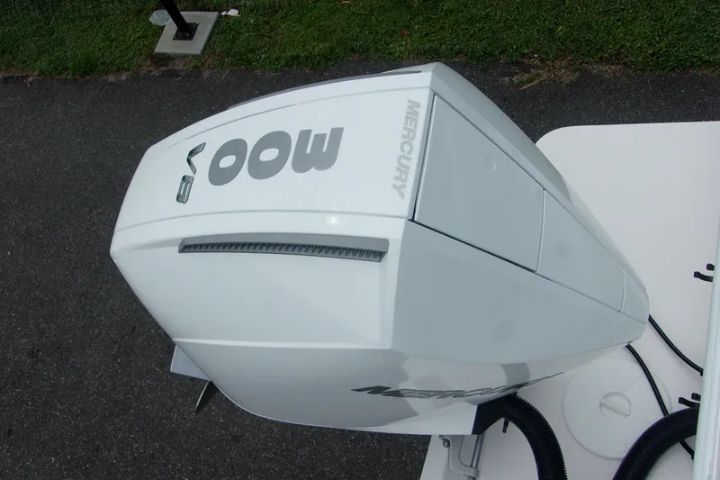 Slide: The Image of 2025 Bluewater 23 T boat with Mercury 400 outboard engine, viewed from above. - 7