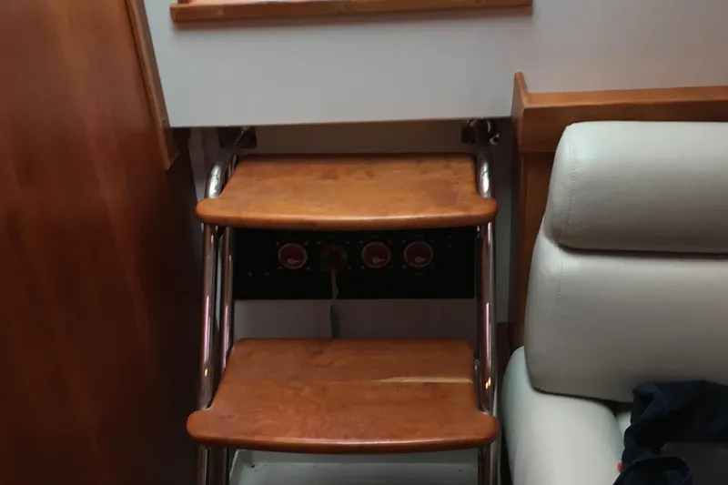 Slide: The Image of Interior wooden steps on a 2008 Back Cove 33 Hard Top Express boat. - 25