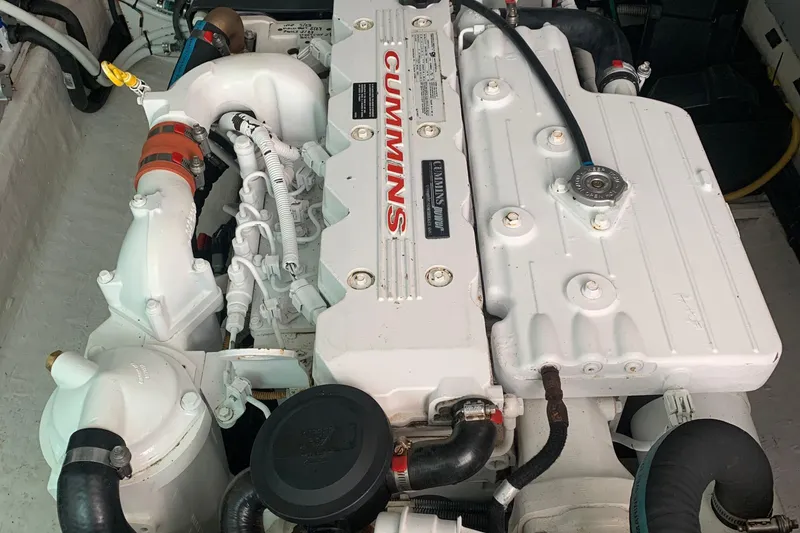 Slide: The Image of Engine compartment of a 2008 Back Cove 33 Hard Top Express with Cummins engine. - 33