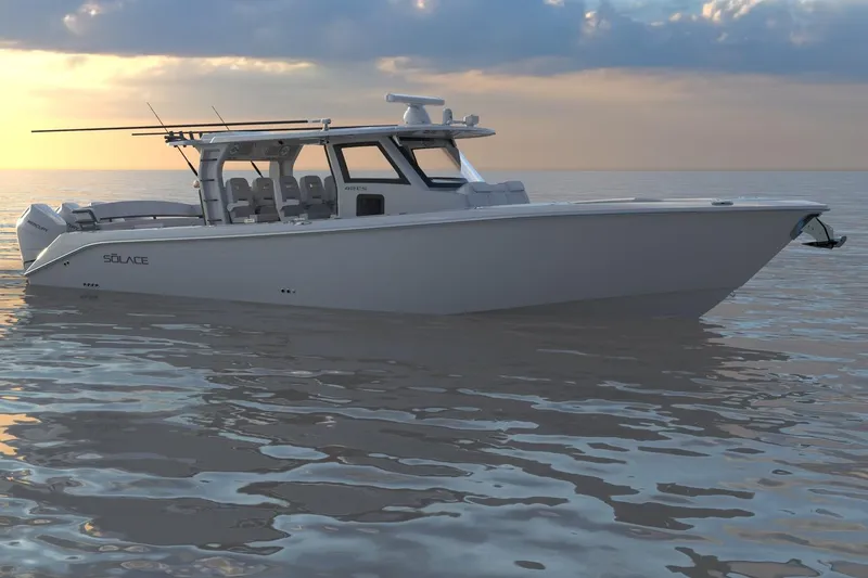 Slide: The Image of 2026 Solace 42 CS boat on calm water at sunset. - 6