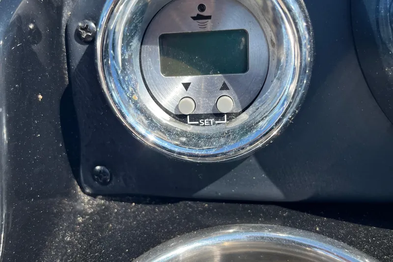 Slide: The Image of Close-up of a 2019 Crownline 205 SS boat dashboard gauge. - 13