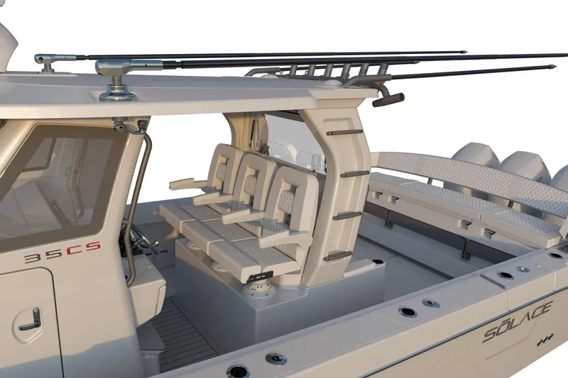 Slide: The Image of 2026 Solace 35 CS boat interior with seating and fishing rod holders. - 5