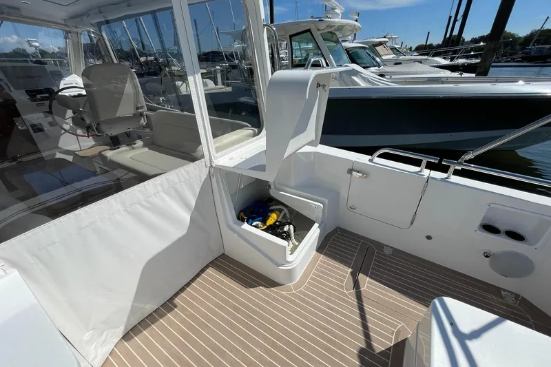 Slide: The Image of 2023 MJM 35 boat with Garmin radar and dual horns at marina. - 18