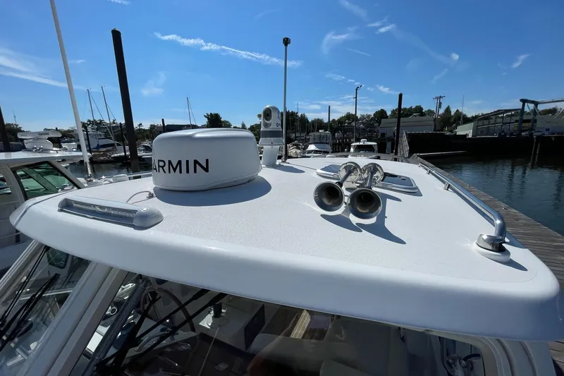 Slide: The Image of 2023 MJM 35 boat with FLIR camera, docked in a marina. - 21