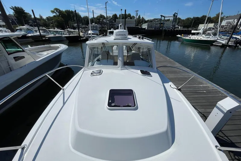 Slide: The Image of Bow of 2023 MJM 35 boat with anchor and winch at dock. - 22