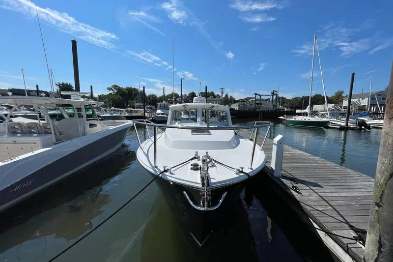 Slide: The Image of Luxurious 2023 MJM 35 yacht interior with wood finish and modern amenities. - 9