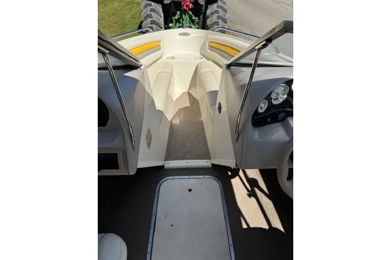 Slide: The Image of 2003 Stingray 180LS boat interior with dashboard and seating area. - 3