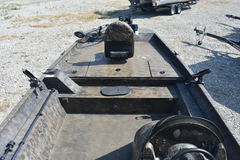 Slide: The Image of 2012 G3 1860 SC CAMO boat interior with camouflage design and steering console. - 7