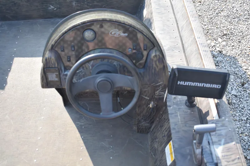 Slide: The Image of 2012 G3 1860 SC CAMO boat dashboard with Humminbird fish finder. - 8