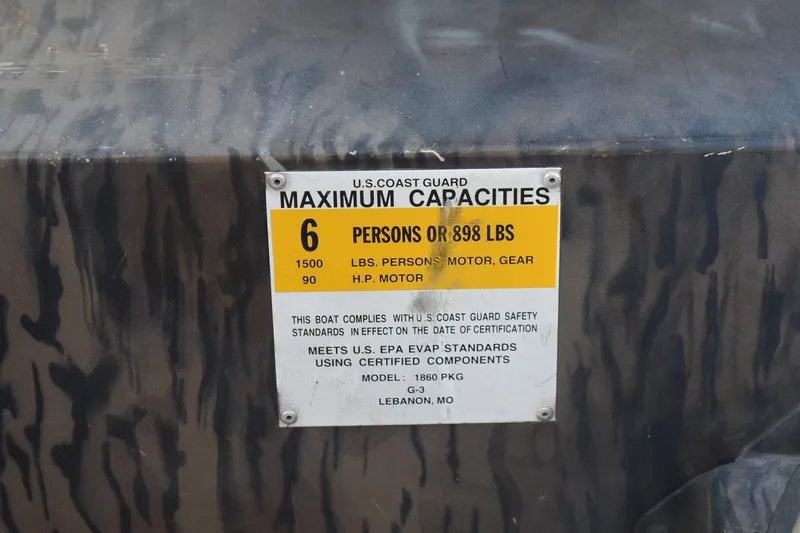 Slide: The Image of 2012 G3 1860 SC CAMO boat capacity label, maximum 6 persons or 898 lbs. - 9