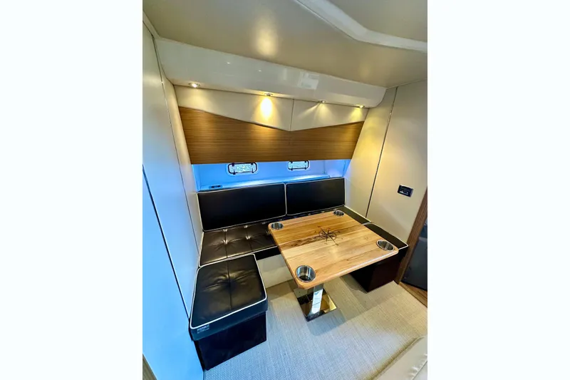 Slide: The Image of Luxurious interior of 2013 Azimut Verve 40 yacht with modern seating and entertainment area. - 77