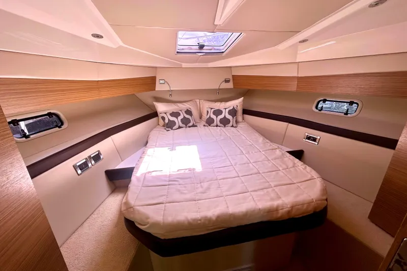 Slide: The Image of Luxurious interior of 2013 Azimut Verve 40 yacht with modern amenities and wooden table. - 80