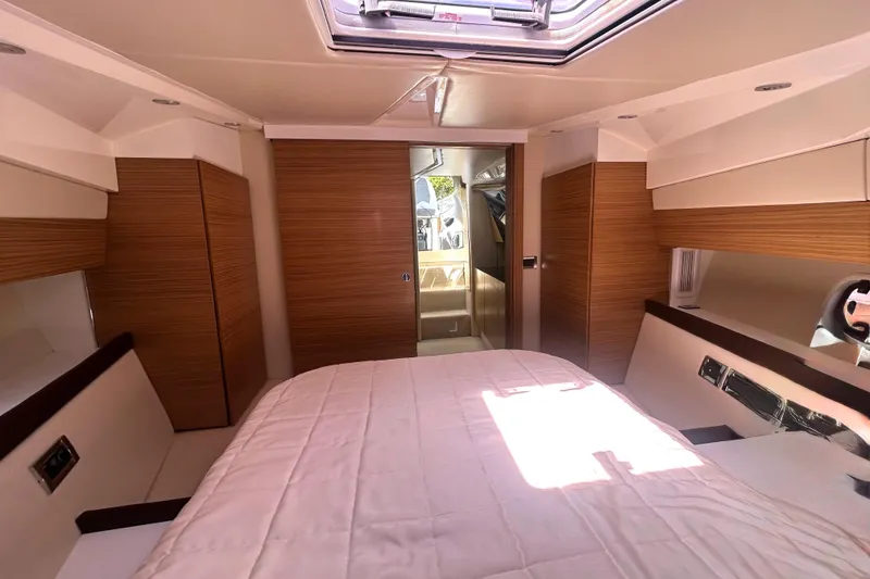 Slide: The Image of Interior of 2013 Azimut Verve 40 yacht with modern seating and table. - 81