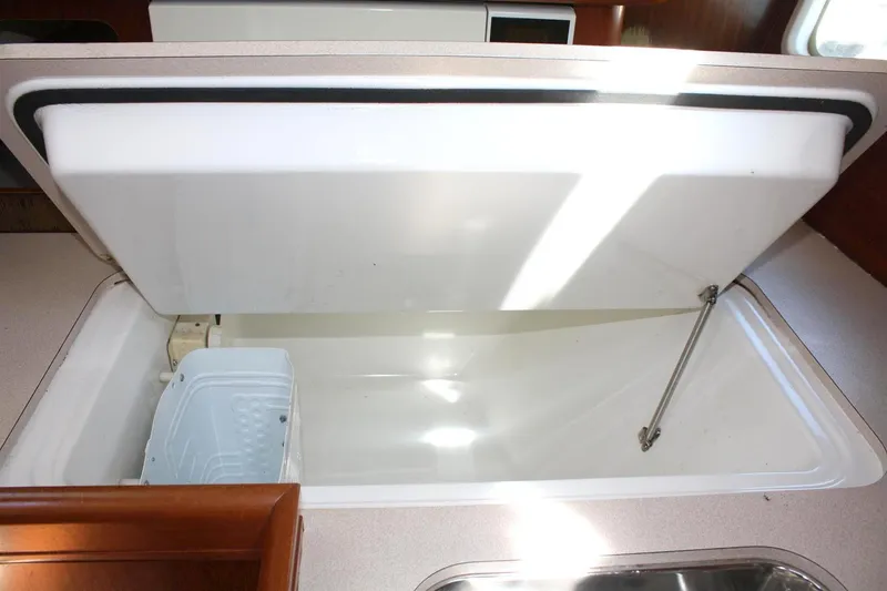 Slide: The Image of Open storage compartment in 1999 Beneteau Oceanis 352 yacht interior. - 20