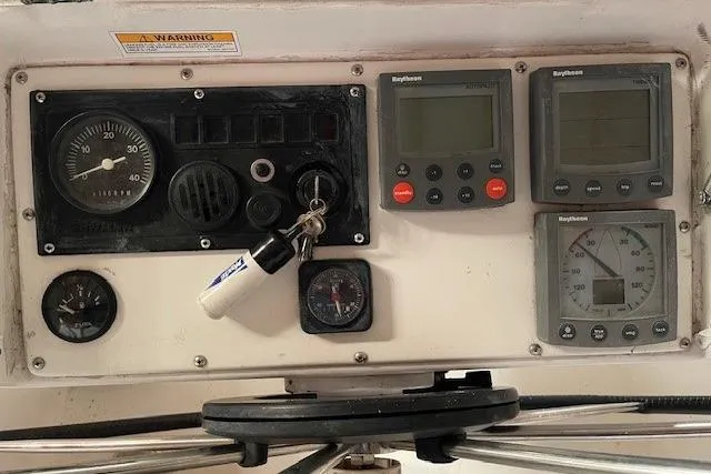 Slide: The Image of Control panel of a 1999 Beneteau Oceanis 352 sailboat with navigation instruments. - 7