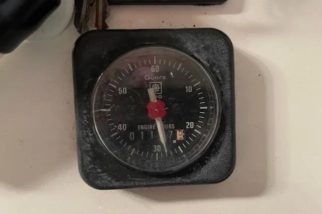 Slide: The Image of Engine hour meter on a 1999 Beneteau Oceanis 352 sailboat dashboard. - 8