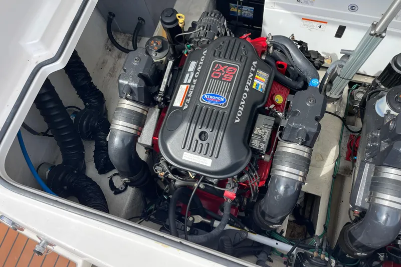 Slide: The Image of Interior of 2011 Regal 3060 Express Cruiser with cozy dining area and bed. - 25