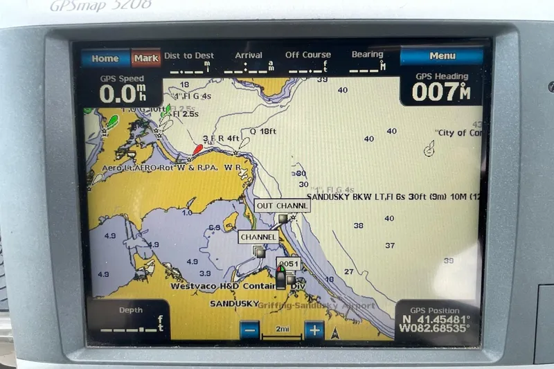 Slide: The Image of Control panel of 2011 Regal 3060 Express Cruiser with Garmin navigation system. - 7