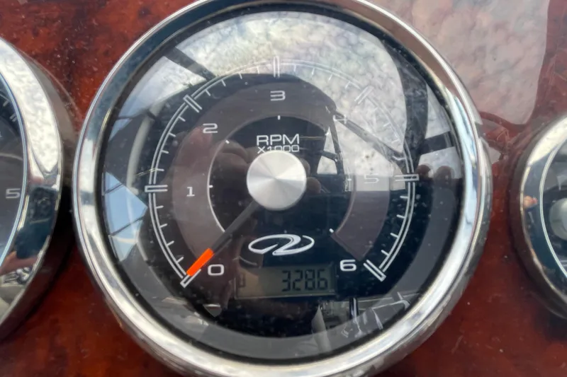 Slide: The Image of GPS navigation screen on a 2011 Regal 3060 Express Cruiser, showing Sandusky area map. - 9