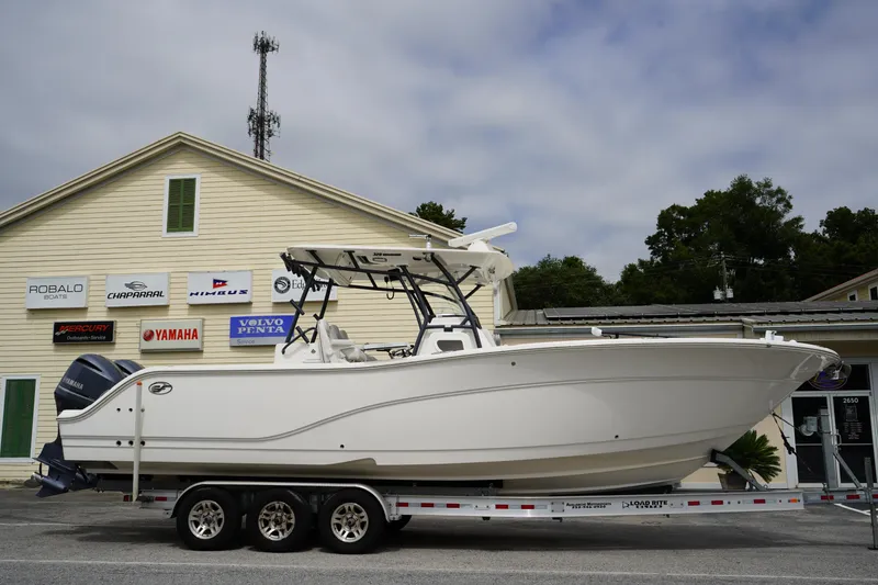The Image of 2020 Sea Fox 328 Commander boat on trailer outside dealership. - 0