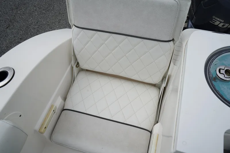 Slide: The Image of White cushioned seat on 2020 Sea Fox 328 Commander boat, featuring diamond stitching. - 10
