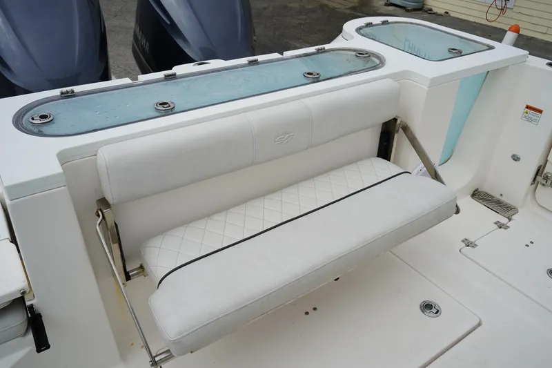 Slide: The Image of 2020 Sea Fox 328 Commander boat with cushioned seating and dual livewells. - 11