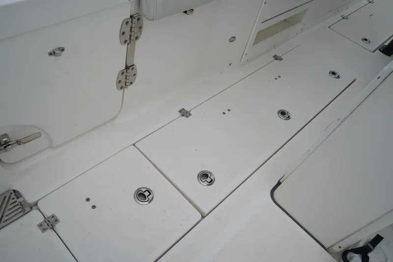 Slide: The Image of 2020 Sea Fox 328 Commander deck with storage compartments and stainless steel hardware. - 18