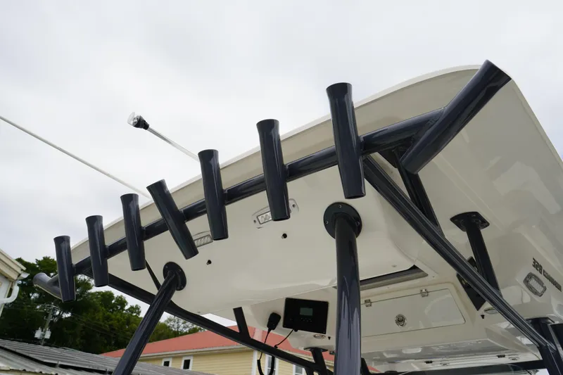 Slide: The Image of 2020 Sea Fox 328 Commander boat with rod holders and T-top, viewed from below. - 25