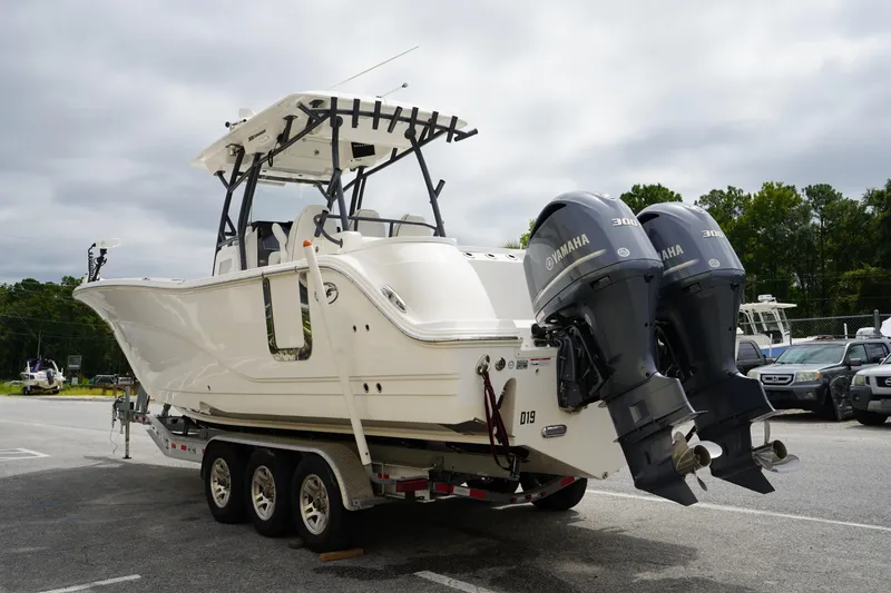 Slide: The Image of 2020 Sea Fox 328 Commander boat with dual Yamaha engines on a trailer. - 3