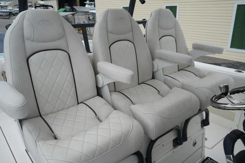 Slide: The Image of Luxurious seating on 2020 Sea Fox 328 Commander boat with quilted upholstery and armrests. - 30