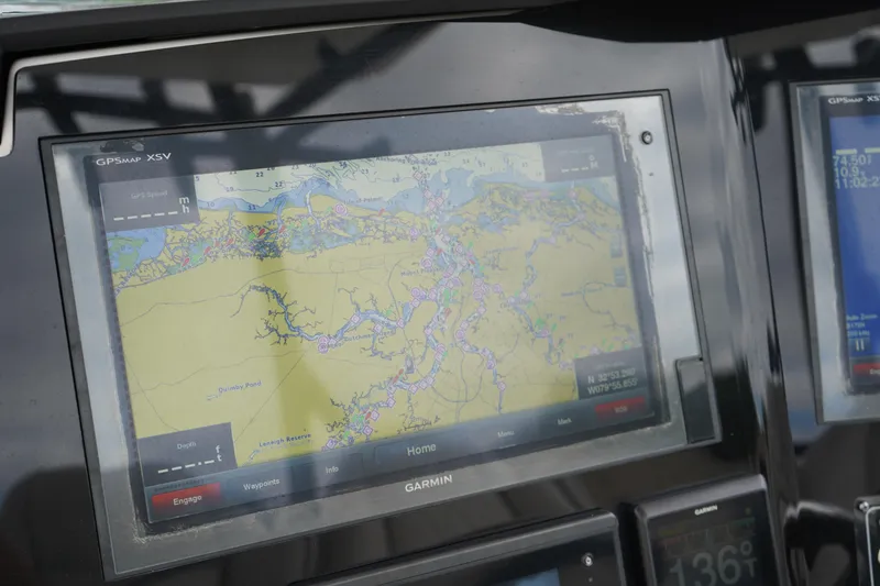 Slide: The Image of Garmin GPS display on 2020 Sea Fox 328 Commander boat, showing detailed nautical map. - 36