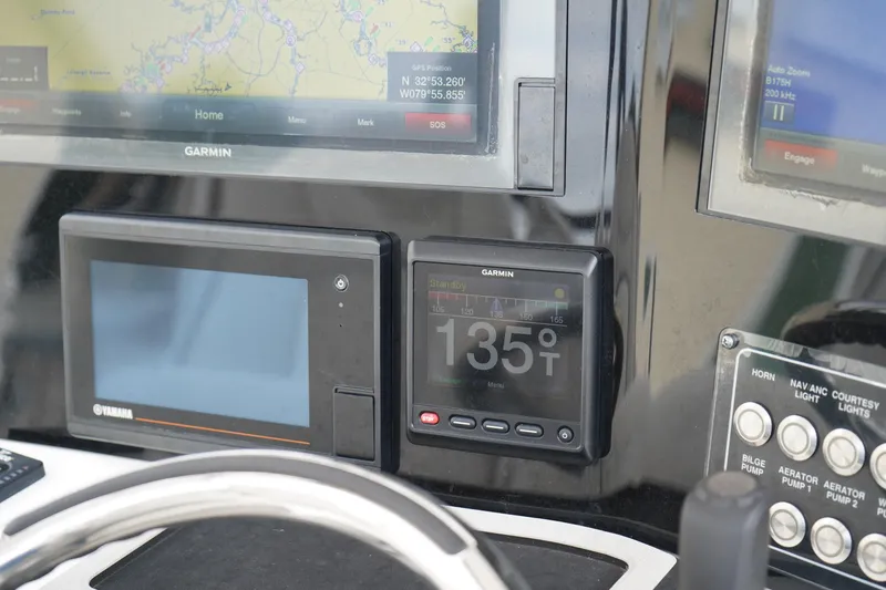 Slide: The Image of Control panel of a 2020 Sea Fox 328 Commander with Garmin navigation system. - 38
