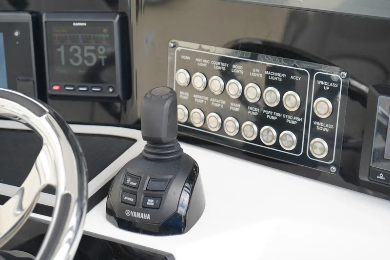 Slide: The Image of Control panel of 2020 Sea Fox 328 Commander boat with Yamaha joystick and Garmin display. - 40