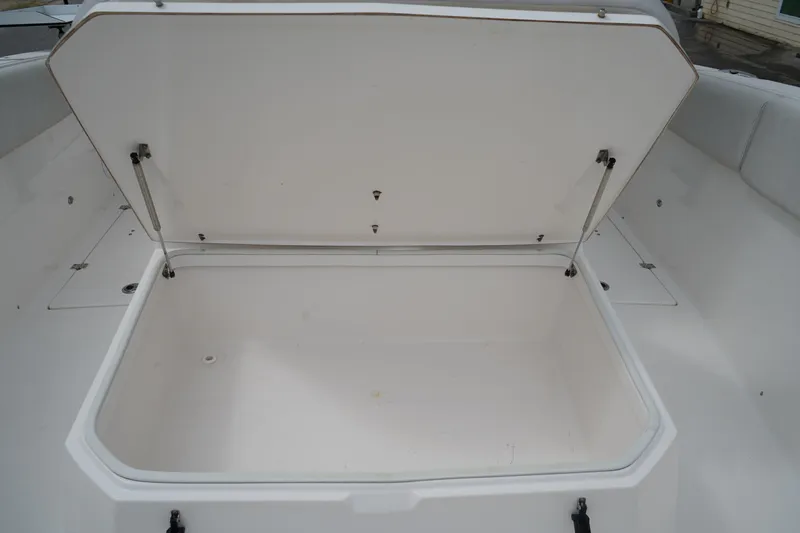 Slide: The Image of Open storage compartment on 2020 Sea Fox 328 Commander boat. - 54